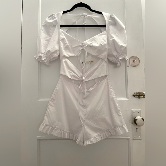 For Love and Lemons white cutout romper with puff sleeves. Size small. - Picture 2 of 5